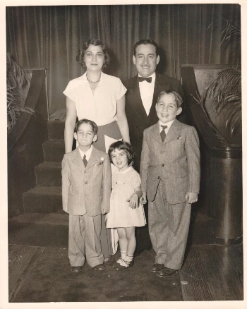 A black and white photo of Michael Neidorff as a child with this family