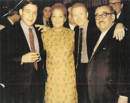 A scan of an older photo of Michael Neidorff with three others